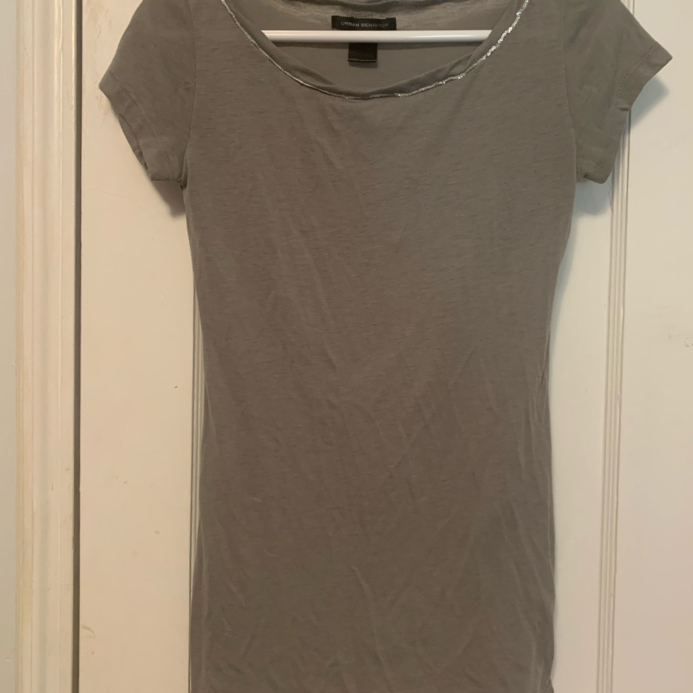 Gray top with neck details.